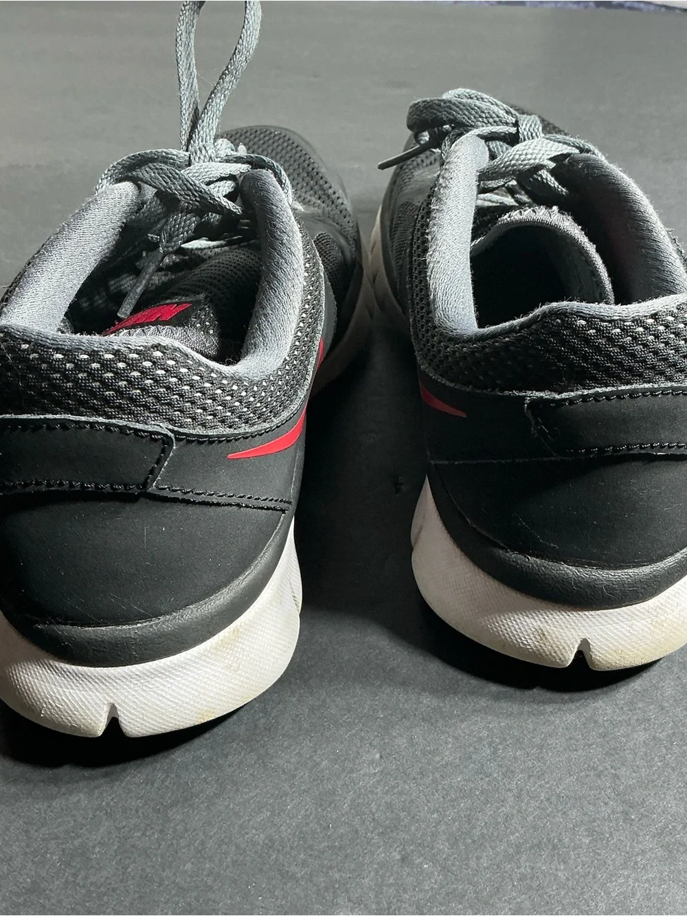 Youth black Athletic Sneakers with Red Accents